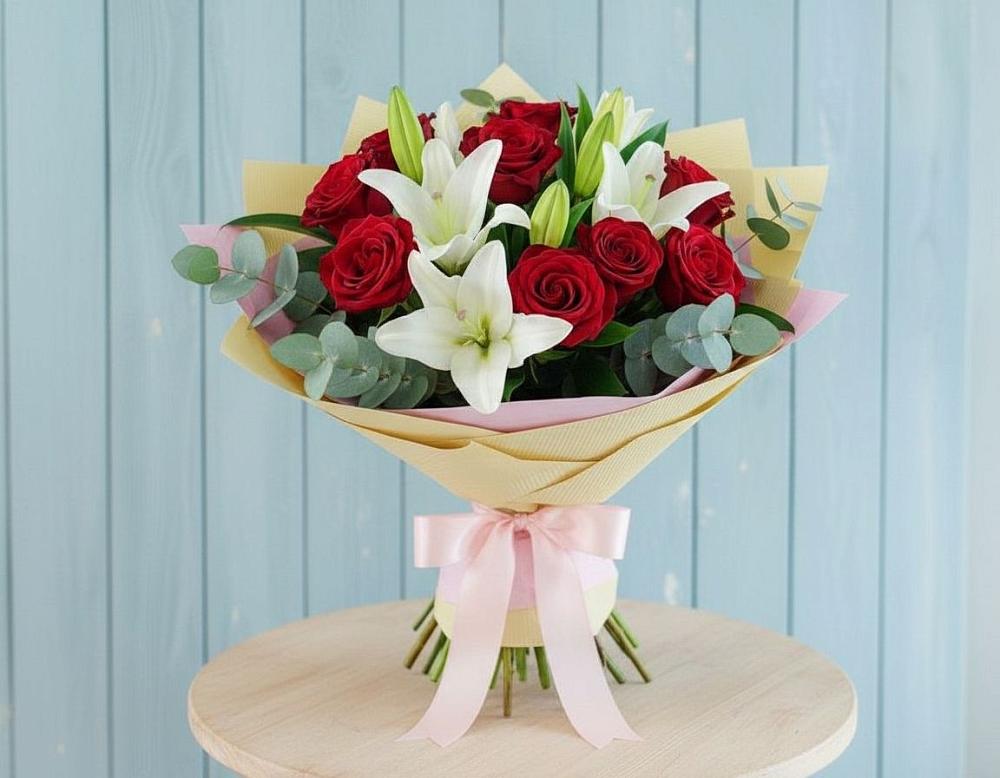 Букет цветов из: Лилии и Розы в Белую Колпь